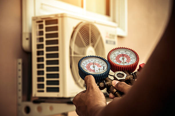 Professional Heat Pump Repair technician working in Brinklow, MD